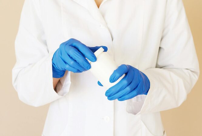 crop doctor opening jar of pills
