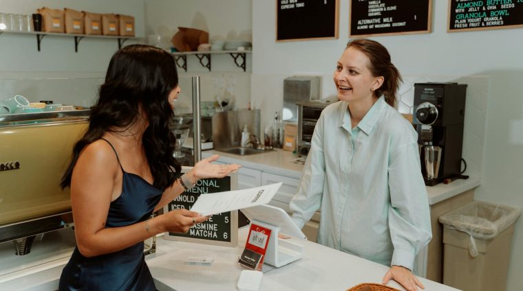 barista taking orders from a customer
