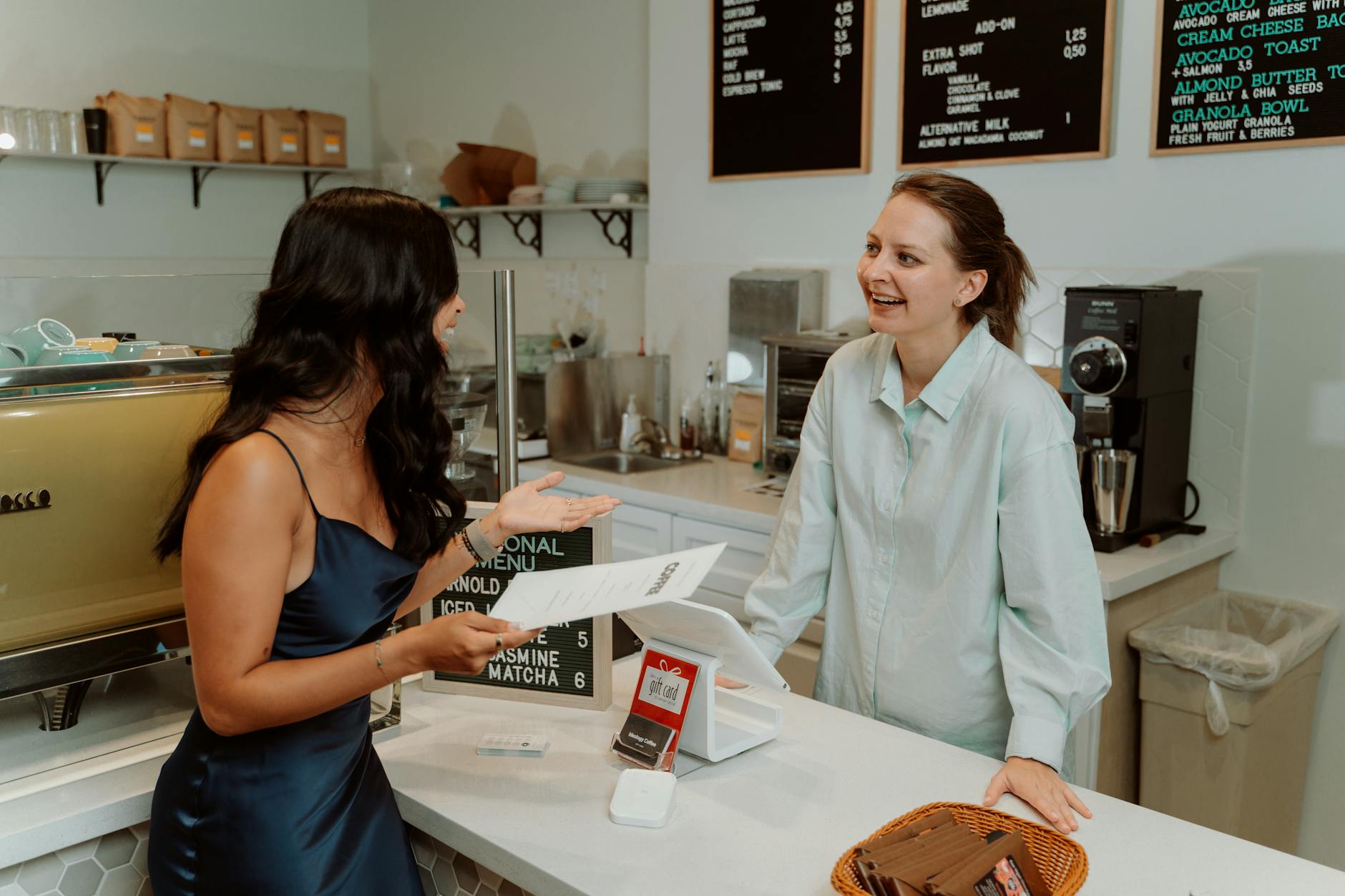 barista taking orders from a customer